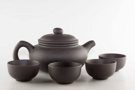 yixing clay tea accessories isolated on white background