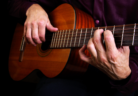 Playing an Acoustic Guitar. Closeup.の写真素材