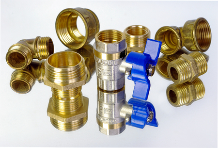 Water tap and fittings for water supply. Plumbing fixtures and piping parts. Sanitary and technical works.の写真素材