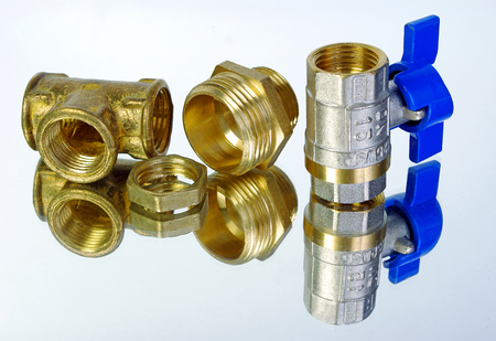 Water tap and fittings for water supply. Plumbing fixtures and piping parts. Sanitary and technical works.の写真素材