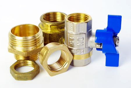 Water tap and fittings for water supply. Plumbing fixtures and piping parts. Sanitary and technical works.の写真素材