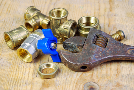Water tap and fittings for water supply. Plumbing fixtures and piping parts. Sanitary and technical works.の写真素材