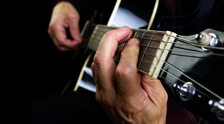 Playing an Acoustic Guitar. Copy spaces.の写真素材