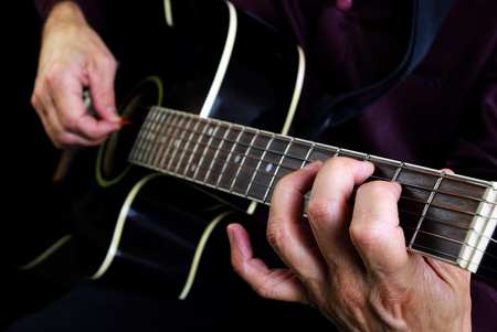 Playing an Acoustic Guitar. Copy spaces.の写真素材