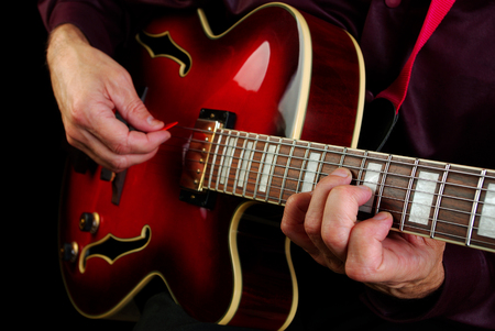 playing electric guitar. play the guitar. copy spaces.の写真素材