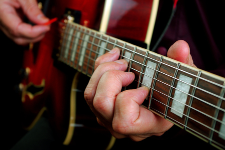 playing electric guitar. play the guitar. copy spaces.の写真素材