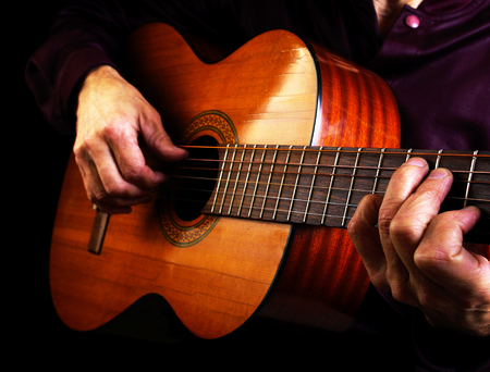 Playing an Acoustic Guitar. Closeup.の写真素材