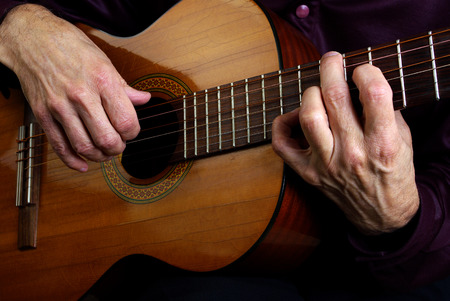 Playing an Acoustic Guitar. Closeup.の写真素材