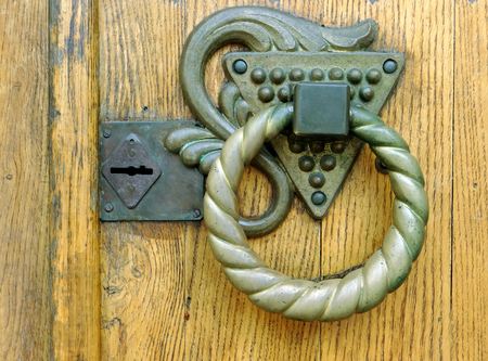 Bronze vintage door handle. Closeup.の写真素材