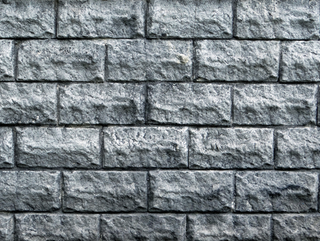 Gray stone wall. Shades of gray.の写真素材