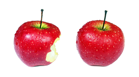 whole and bitten apple isolated on whiteの写真素材