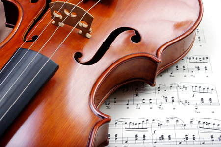 Violin on sheet music. close up.の写真素材