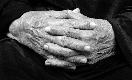 Wrinkled hands of an old woman. Copy spaces. Mother's native hands.の写真素材