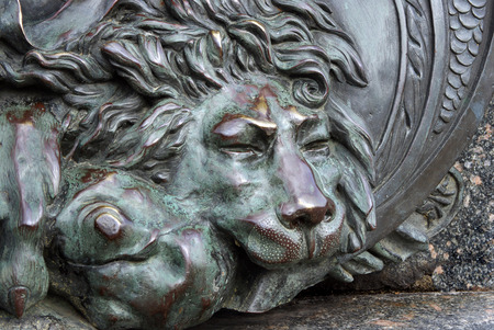 head of a bronze lion. Sculpture in Poltava, Ukraineの写真素材