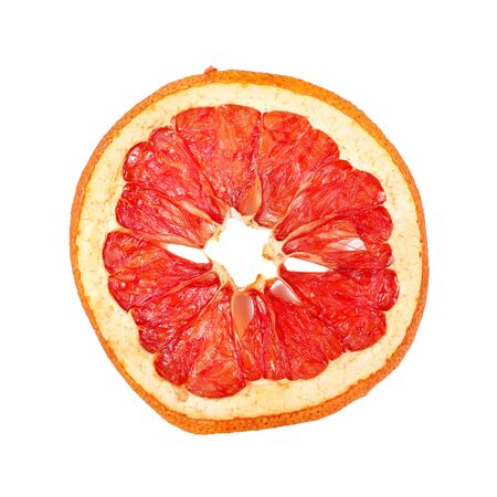 Slice Of Dried Grapefruit Isolated On White.の写真素材