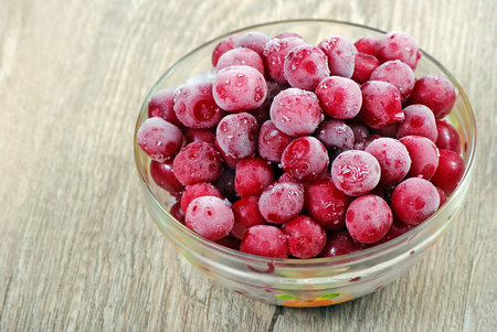 frozen cherry in a glass bowl copy spaces
