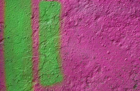 painted purple plastered concrete wall. abstract purple texture background. Bright purple and green colors.の写真素材
