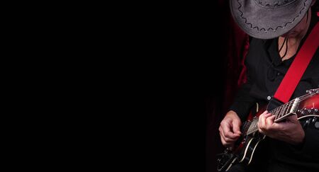 Guitarist hands and guitar close up. playing electric guitar.の写真素材