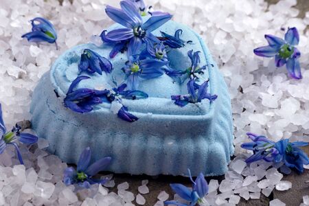SPA composition with blue bath bomb. bath bomb, sea salt and blue flowersの写真素材