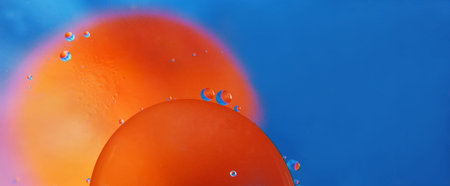 abstract space background. drops of oil in water. abstract orange and blue background. copy space