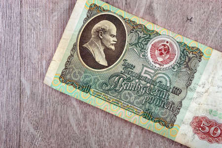 old banknote of 50 rubles of the Soviet Union on a wooden tableの写真素材