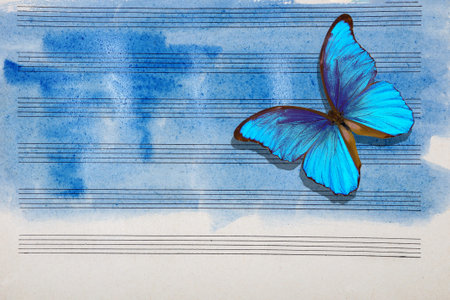 Morpho blue butterfly and notes. Butterfly melody. Old music sheet in blue watercolor paint. Blues...