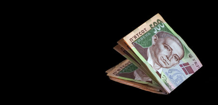 banknotes of five hundred Ukrainian hryvnia isolated on black