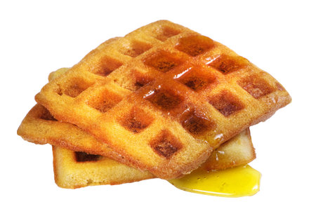 waffles with honey isolated on white
