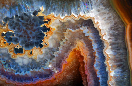 gold and blue background. abstract natural pattern. stone agate texture background. natural stone ornament close upの写真素材