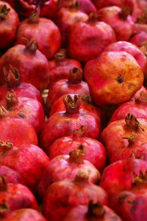 colorful ripe pomegranates in the market