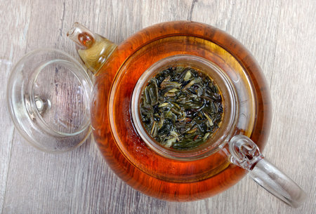 green tea brewed in a teapot. top viewの写真素材
