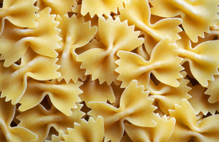 Traditional italian farfalle pasta with selective focus. close up. butterfly-shaped italian pasta