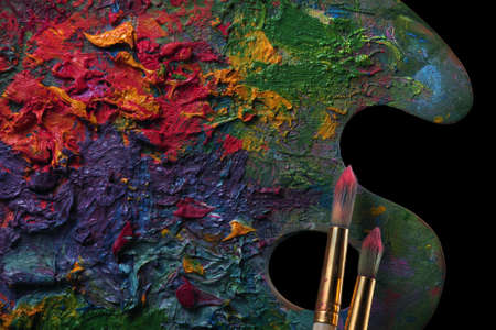 artist's palette and brushes, background for design.の写真素材