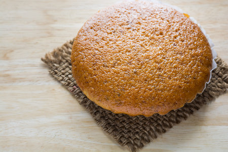 banana cake on wood background.