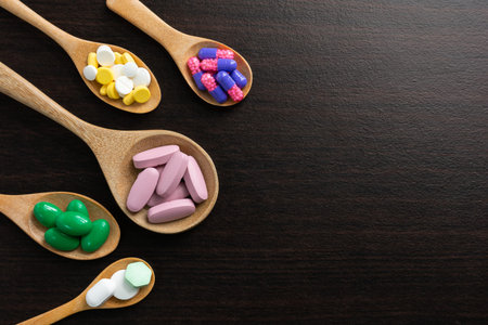 Colorful different tablets pills capsule heap mix therapy drugs doctor flu antibiotic pharmacy...