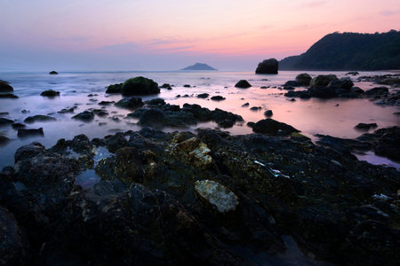 Sea sunset with rock. krating bay â€ŽChanthaburi thailand.