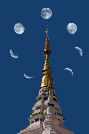 Moon on the temple.の写真素材