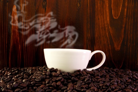 Cup of coffee and coffee beans の写真素材