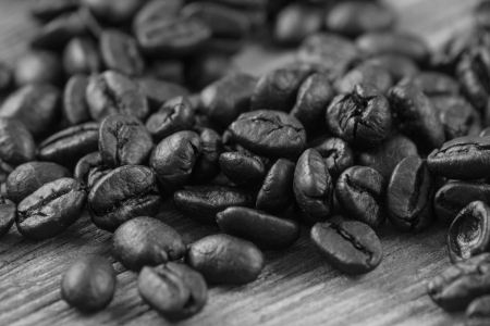 Coffee beans closeup on wooden floors.の写真素材