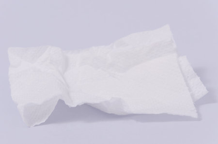 Isolated of a used wrinked tissue paper on white backgroundの写真素材