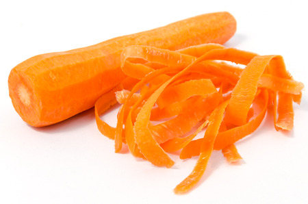 Peeled fresh carrot isolated on white backgroundの写真素材