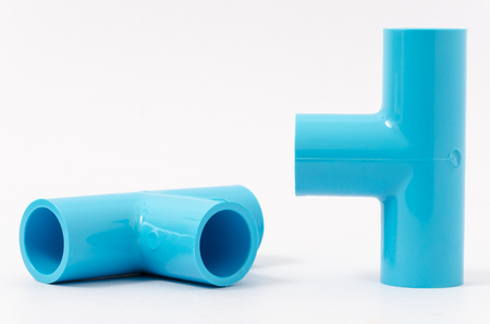New blue plastic pvc pipe in T shape for connect 3 pipes  isolated on white backgroundの写真素材