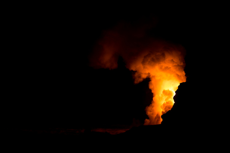 Steam from lava entry the oceanの写真素材