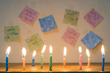 Birthday greeting note and candle light,の写真素材