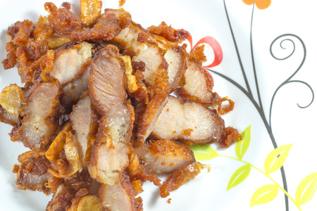 Thai cooking dish, fried pork with garlicの写真素材