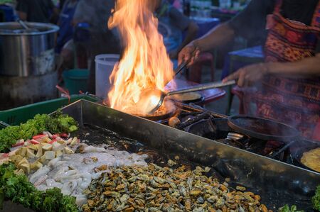 street food in thailand fried fish-paste balls in panの写真素材