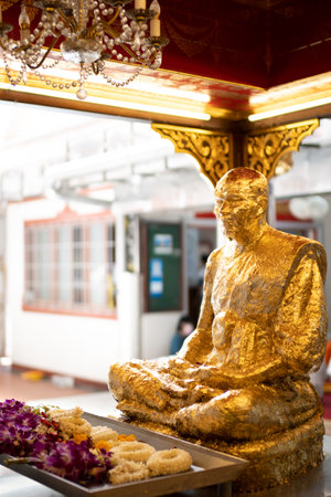 Bangkok, Thailand - June 18, 2022. Wat Paknam Phasi Charoen.  Golden Buddha Statues.のeditorial素材