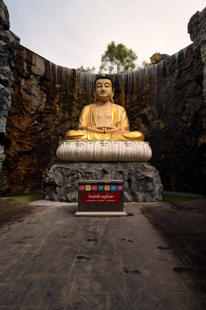 Samut Sakhon, Thailand - July 31, 2022.    Wat Lak Si Rat Samoson A Buddhist temple famous for the reclining Buddha and also the other statue surrounded by imitated rocks.の写真素材