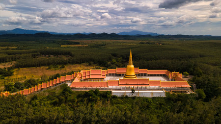 Chon Buri, Thailand, December 4, 2022 . Wat Boonyawad. It is a temple with a very wide area.There is a Pagoda on the hill natural atmospheremountain viewのeditorial素材
