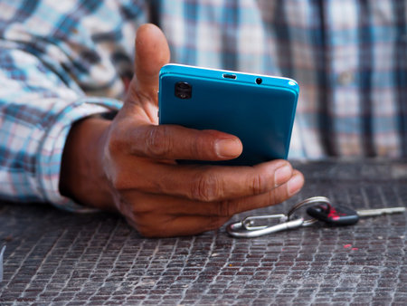 Closeup Of Lonely . Hands Is Holding Cellphone